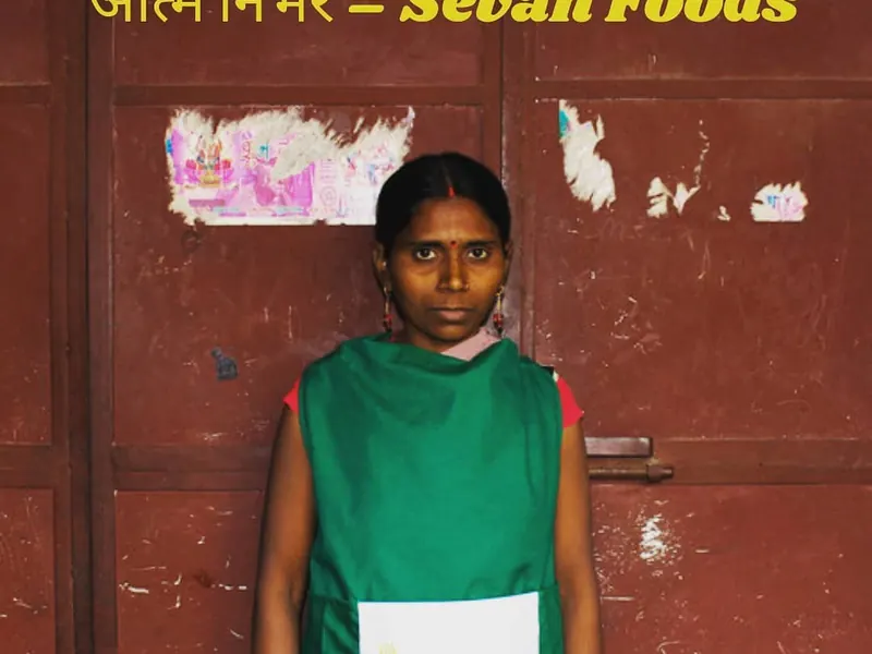 Sewan canteen in-charge in a green apron
